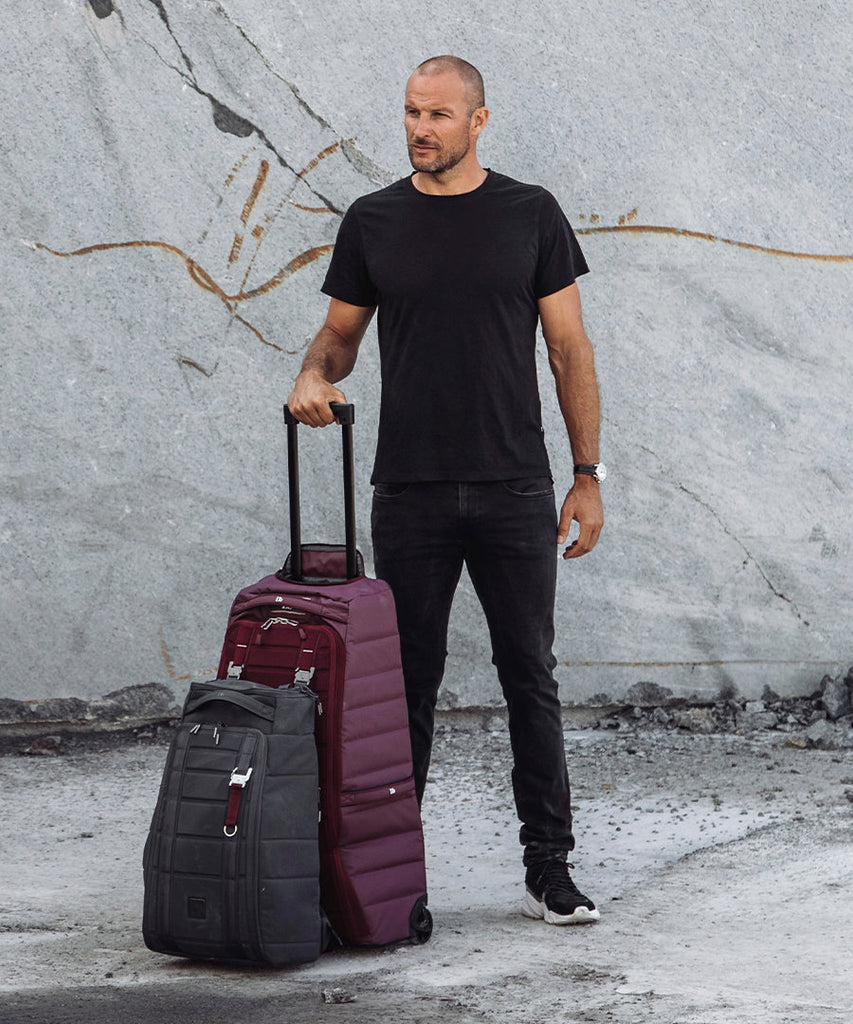The Strøm 60L Roller bag Raspberry-Db (Formerly Douchebags)-bags luggage