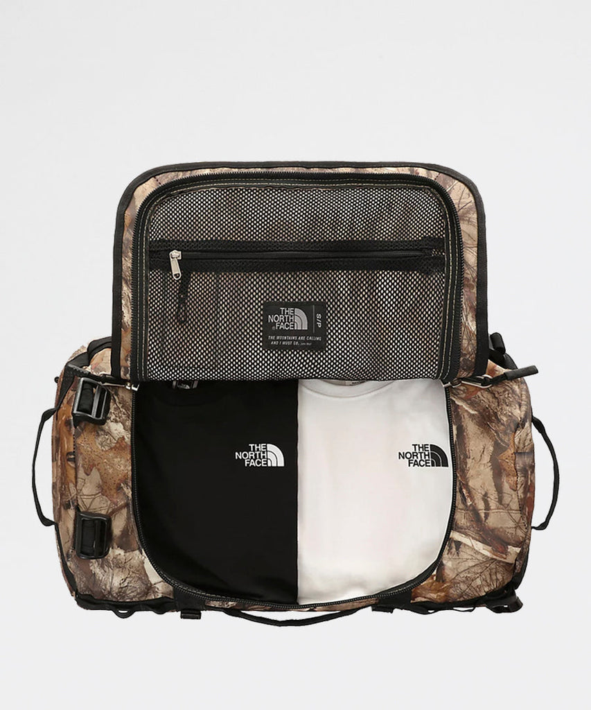 The North Face Base Camp Kelp Tan Forest Floor Print Small Tasker Kuffert